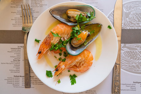 Exquisite Seafood Feast Mussels and Shrimp Delight on a White Plate, Ready to Enjoy