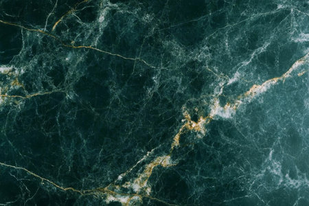 Dark Green Marble Texture with Intricate Veins and Earthy Hues for Creative Design Backgroundsの素材