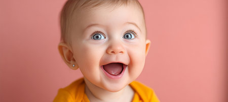Adorable Newborn Baby Smiling Joyfully on Salmon-Pink Backdrop, Capturing Pure Delight and Innocenceの素材