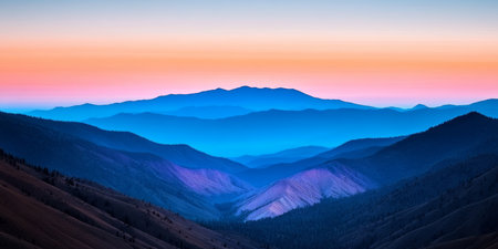 Majestic Layered Mountains at Sunset with Blue and Purple Peaks in a Peaceful Tranquil Landscapeの素材