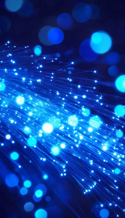 Fiber Optic Cables Transmitting Data Packets with Shining Blue Light Effects in High-Tech Networksの素材