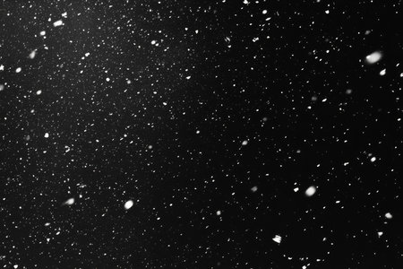 Delicate Blizzard Texture Overlay on Dark Backdrop Evokes Winter Mood with Gentle Snowfall Effectの素材