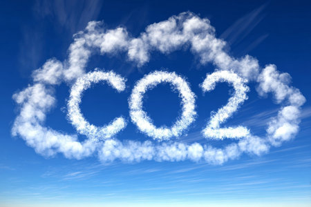A Carbon Dioxide Cloud in a Clear Blue Sky, Symbolizing Today s Major Environmental Challengesの素材