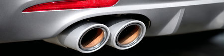 Sleek and Modern Car Design Featuring Dual Exhaust System, Showcasing Automotive Elegance and Powerの素材