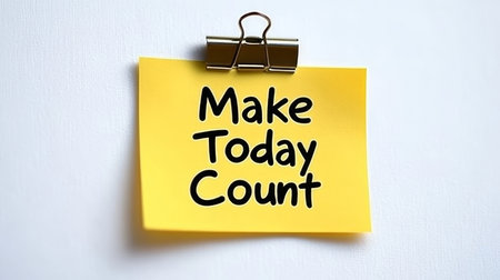 Inspirational Reminder on Yellow Sticky Note Live Life to the Fullest and Make Today Countの素材