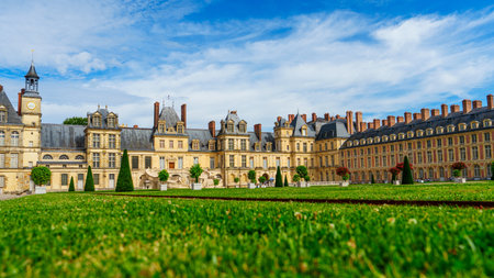 Fontainebleau Palace Majestic French Heritage and Architecture on a Sunny Dayの写真素材