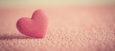 Cute Pink Felt Valentine s Heart Craft Decoration on Fuzzy Knit Background for Romantic Occasionsの素材