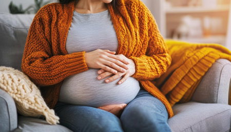 Expecting Mother Embraces Her Unborn Child with Love While Wearing a Cozy Sweater at Homeの素材