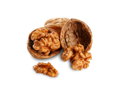 Cracked Walnuts on White Nutritious Snack, Healthy Food Ingredient, and Baking Essential