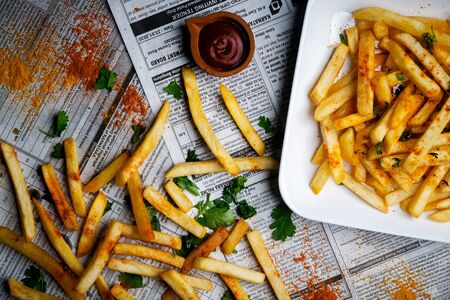 Yummy French fries served with tomato ketchupの写真素材