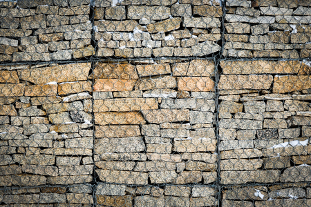 stones are laid by a netの写真素材