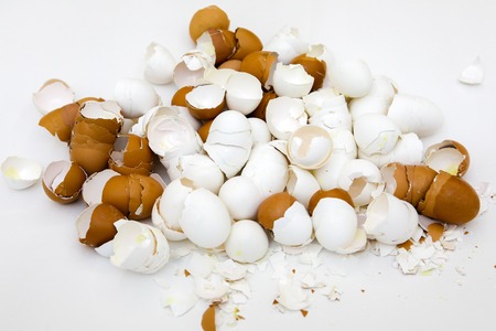 big pile of chopped white and brown chicken shells, close-up
