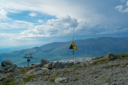 Sign Danger in the ski resort Bolshoy Vudyavr in Kirovsk, Murmansk region