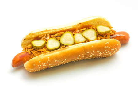 Hot dog with pickled cucumbers and crispy onions on a white backgroundの写真素材