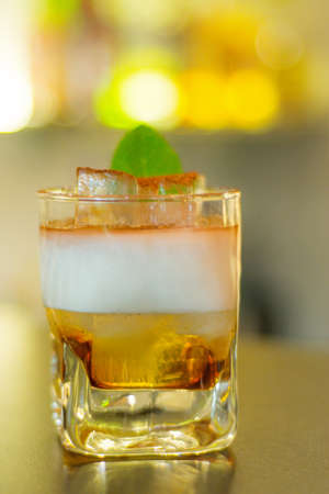 Layered cocktail with mint leavesの写真素材