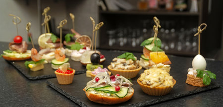 Assorted canapes and tartlets for a buffet tableの写真素材
