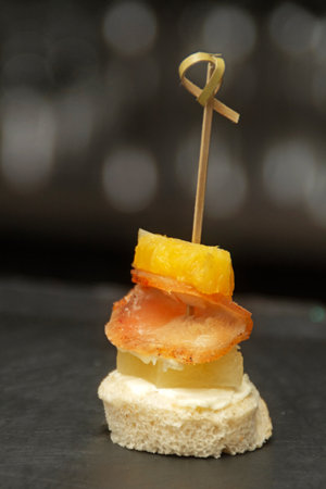 Canape buffet with cheese, smoked chicken, mayonnaise and pineappleの写真素材