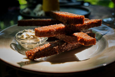 Beer appetizer fried croutons with garlic and sauce.の写真素材