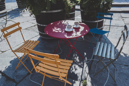 Ready Four Colorful Chairs Outside Coffee Shopの写真素材