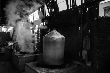 This is a series of photos, the author captures Ask bakers in Binh Thuan Province, Vietnam. Ask cake is often used in the worshiping ceremony, at the temple, or the family. This is a very popular dishのeditorial素材
