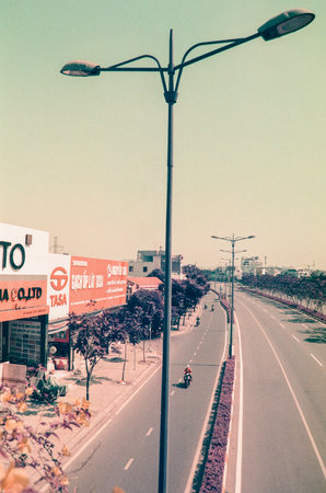 Time: Wednesday morning, December  8, 2021. Location: Ho Chi Minh city. These are images taken from purple lomochrome film. The street scene looks very different, the author hopes viewers will like thのeditorial素材