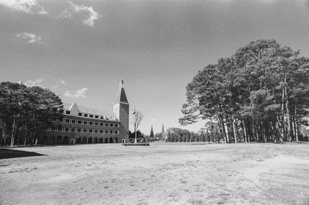 Black and white landscape photo film: Da Lat Pedagogical College. Time: March 5, 2022. Location: DaLat city.  Da Lat is a famous tourist city in Vietnamのeditorial素材