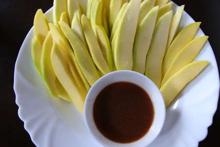Sliced Green Mango with Shrimp Pasteの写真素材