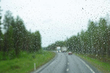 Rain droplets on a window glassの写真素材