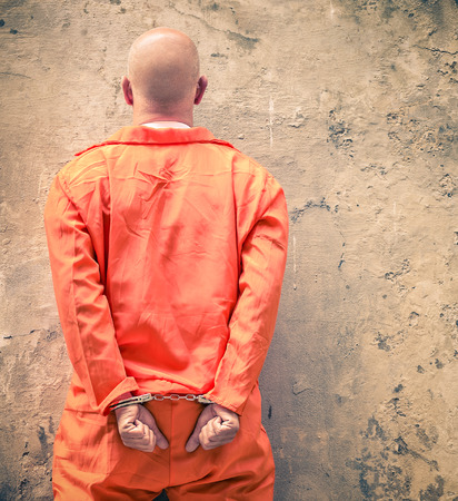 Handcuffed Prisoners waiting for Death Penaltyの写真素材