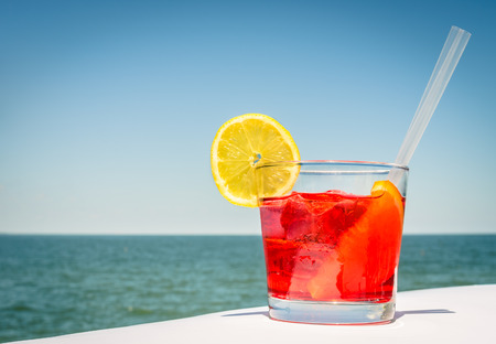 Red Cocktail in a bright Summer Dayの写真素材