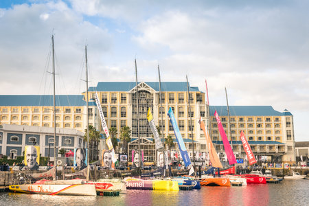 CAPE TOWN, SOUTH AFRICA - NOVEMBER 15, 2014: regatta sailing boats at the waterfront of Cape Town during the Volvo Ocean Race 2014 - 2015. The yacht race is held every three years around the world.のeditorial素材