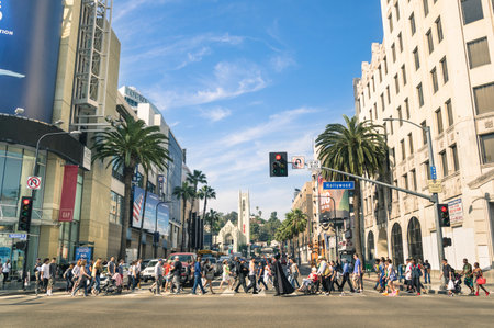LOS ANGELES - MARCH 21, 2015: crowded street with multiracial people walking on Hollywood Boulevard the world famous Walk of Fame created in 1958 as a tribute to artists working in the movie industry.のeditorial素材