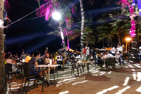 BORACAY, PHILIPPINES - 12 FEBRUARY 2016: multiracial tourists chilling at beach restaurant bar in Boracay - Travel concept with people travelers from all over the worldのeditorial素材
