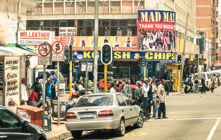 JOHANNESBURG, SOUTH AFRICA - NOVEMBER 13, 2014: rush hour and traffic jam near Von Wiellig Street at crossroad with Commissioner St in the crowded and modern multiracial metropolis of South Africaのeditorial素材