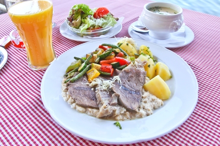 Austrian braised beef with soup and saladの写真素材