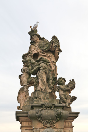 Beautiful outdoor sculpture on Charles bridge in Pragueの写真素材