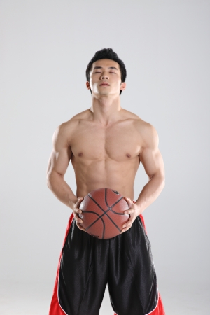Young man playing basketball
の写真素材