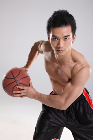 Young man playing basketball
の写真素材