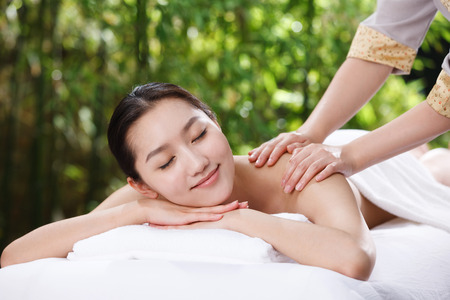 Young woman bathingの写真素材