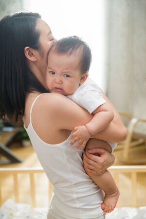 Mother holding the baby