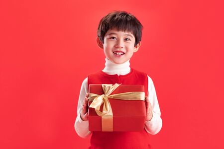 The little boy take the New Year gift