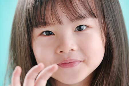 The little girl's lovely faceの写真素材