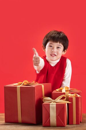 The little boy and the New Year giftの写真素材