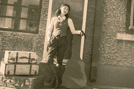 Young woman standing on the railway platform