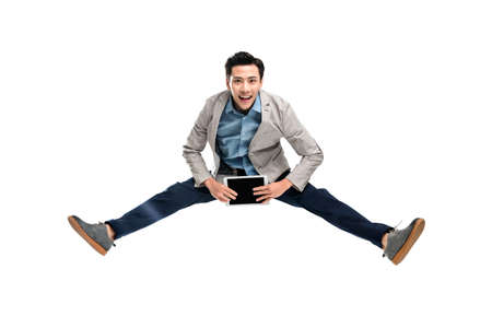 Carrying a laptop bouncing youth business man
