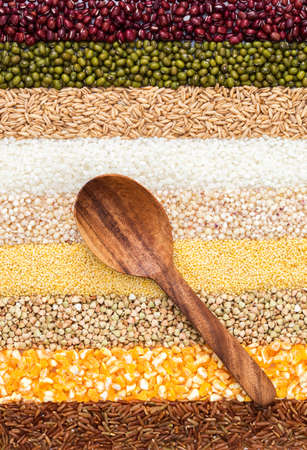 Grain composite tile show and wooden spoonの写真素材