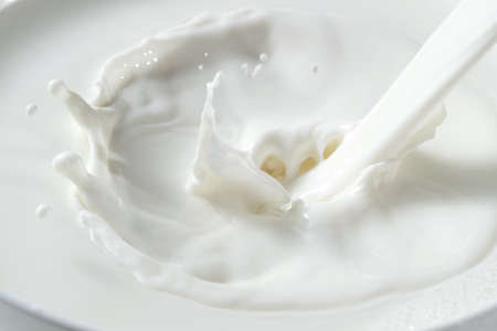 splashed milk close-upの写真素材