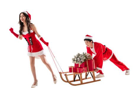 Happy young couples holding the gift boxの写真素材