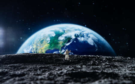 Astronaut standing on the moon surface. 3d rendering.