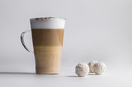 coffee latte in a glass cup on a white backgroundの写真素材